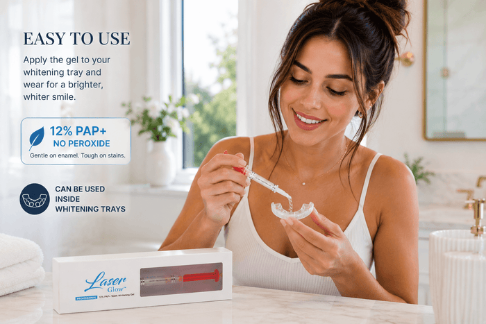 Woman applying PAP+ peroxide-free whitening gel into tray