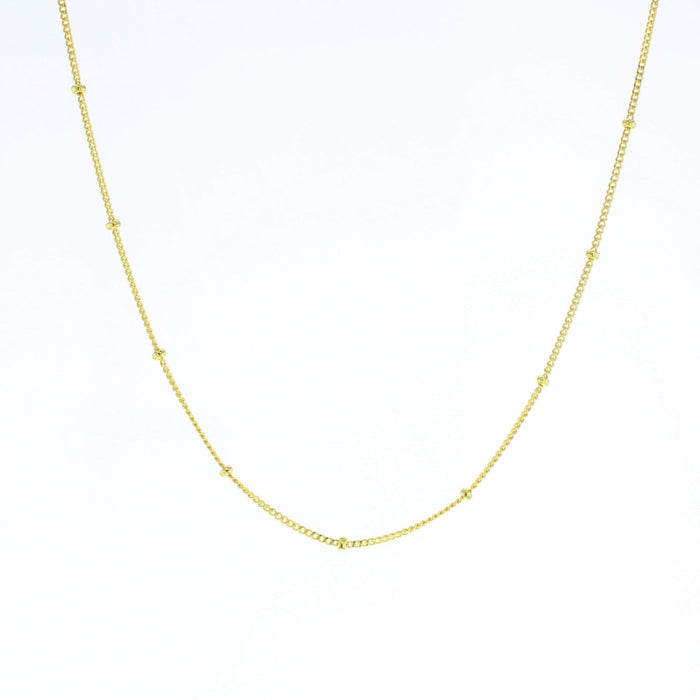 Beaded curb chain necklace in gold tone