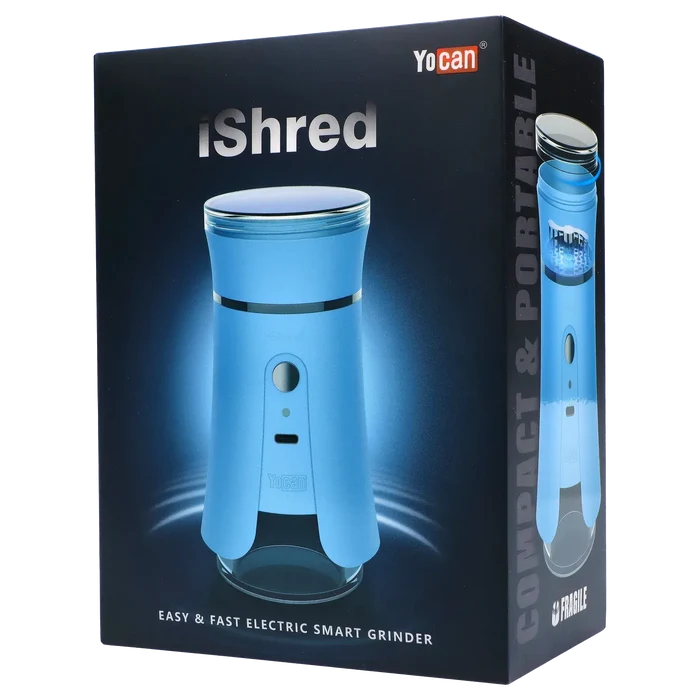 Angled front view of the blue Yocan iShred Electronic Grinder on its dark product box with glossy lighting highlights