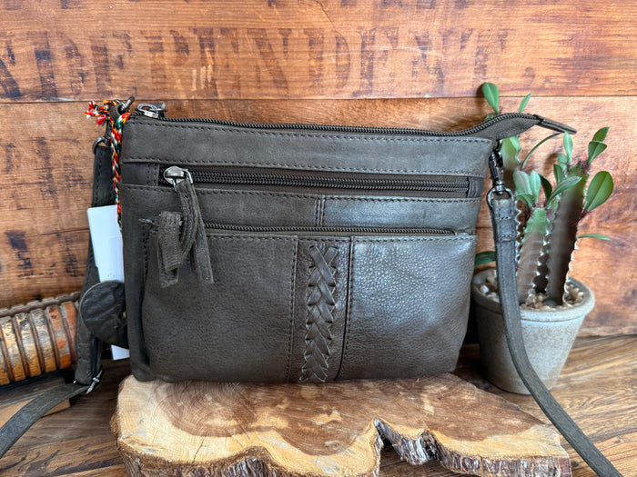 Dark olive leather crossbody purse with dual zip pockets and braided front panel