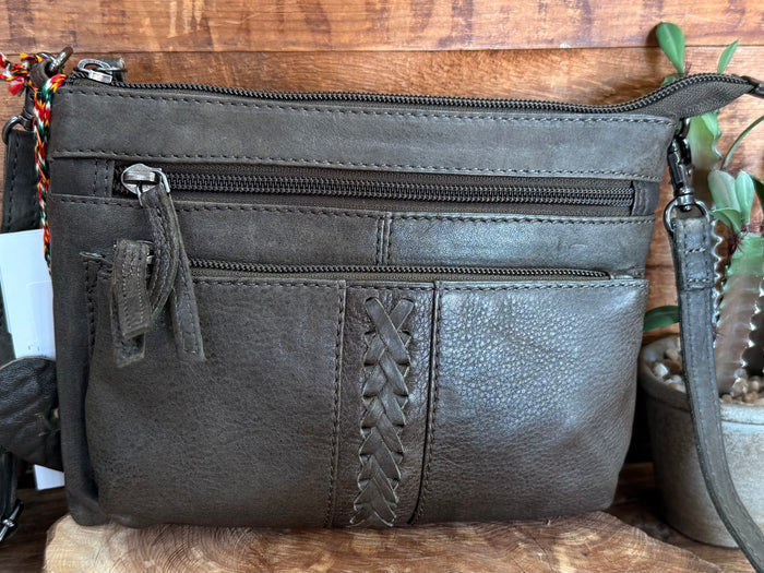 Dark olive leather crossbody purse with zip-top closure and two front compartments
