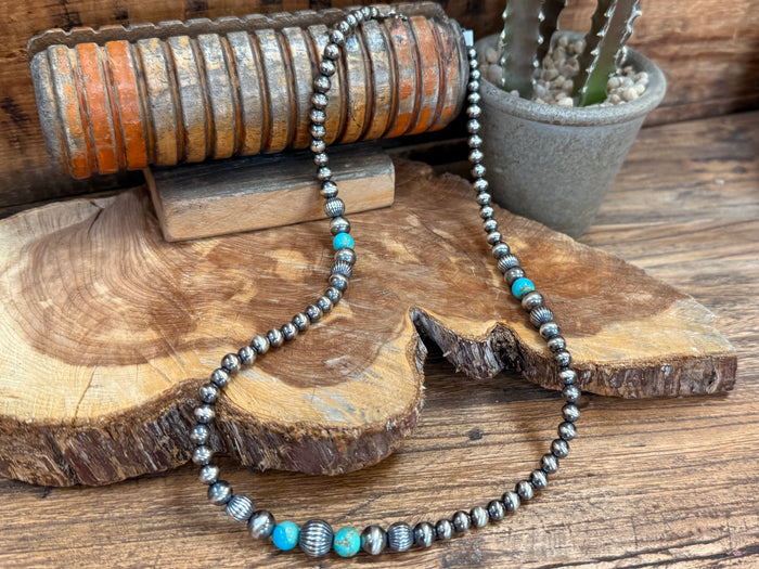 Sterling silver Kingman turquoise necklace, round blue insets with silver heishi beads