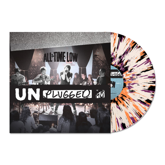 A limited edition All Time Low vinyl with black, purple, and orange splatter peeks from a cover showing the band playing MTV Unplugged live before a seated audience.