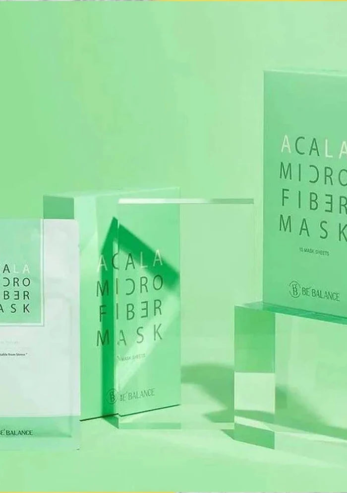 Green Acala Microfiber Mask packaging on a green background