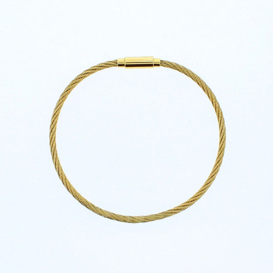 Gold braided charm bangle bracelet with a slim bar clasp detail
