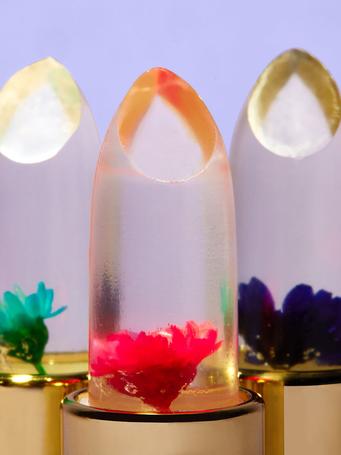 close up of the tips and flowers in the flower pH lip balm trio