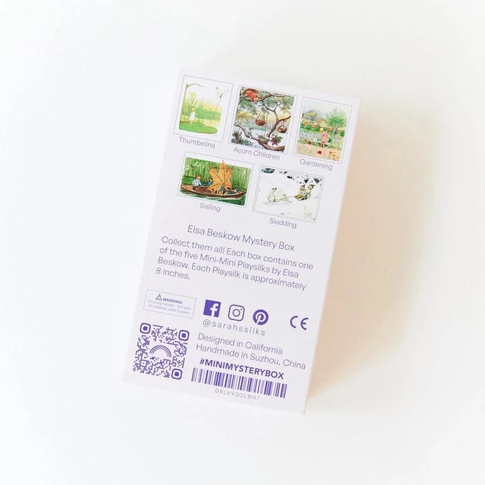 The back of a white Elsa Beskow Mystery Box card package, showing five small illustrated card previews on a white background.