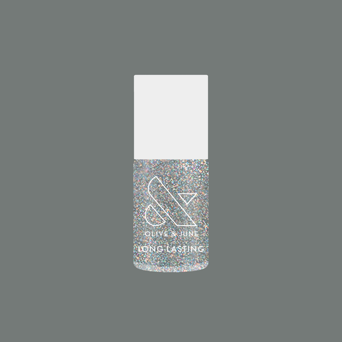 Glitter Department holographic silver glitter nail polish bottle by Olive and June for long-lasting mani looks