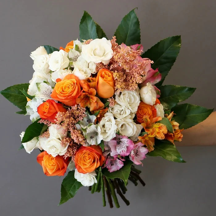 Summer Orange Flower Bouquet in a Hand