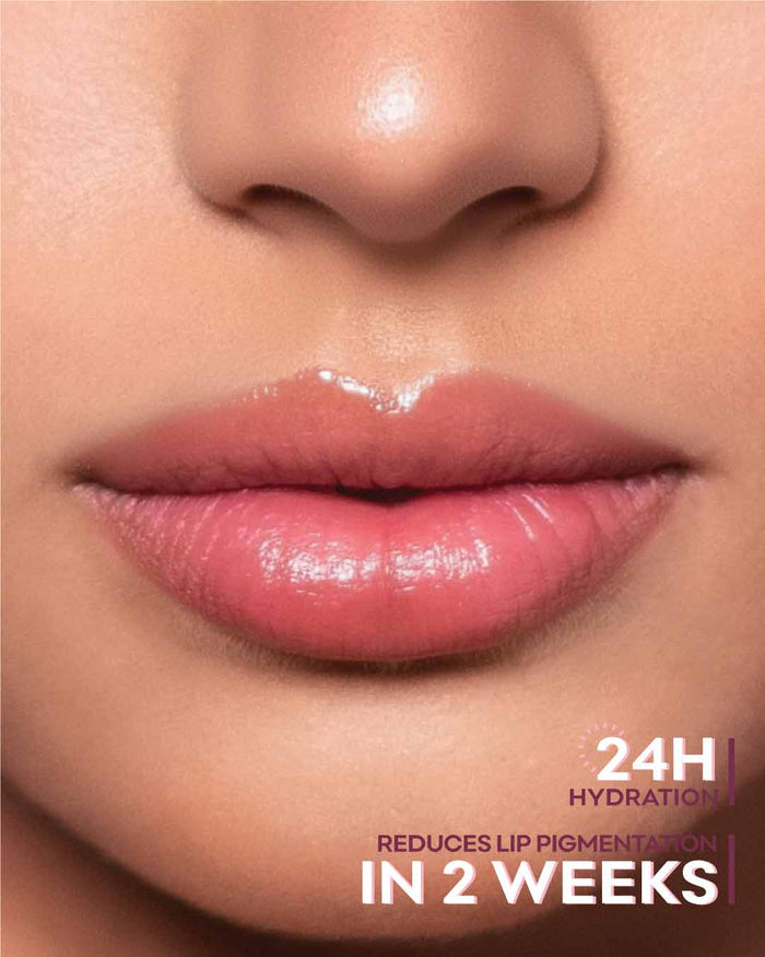 Lips picture of a girl using Nirvana Botanics Berry Plump lip balm