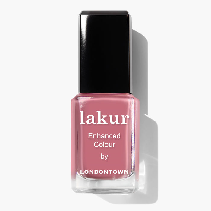 Bottle of LONDONTOWN Lakur Enhanced Colour vegan nail polish in the Mojave Mauve shade with a black cap.
