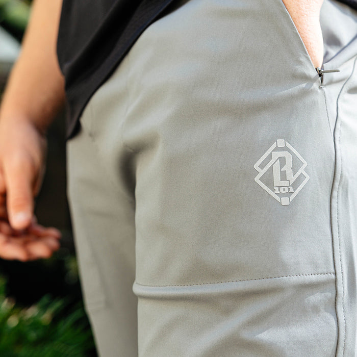 Youth model wearing gray Pro Series Active Pants youth pants