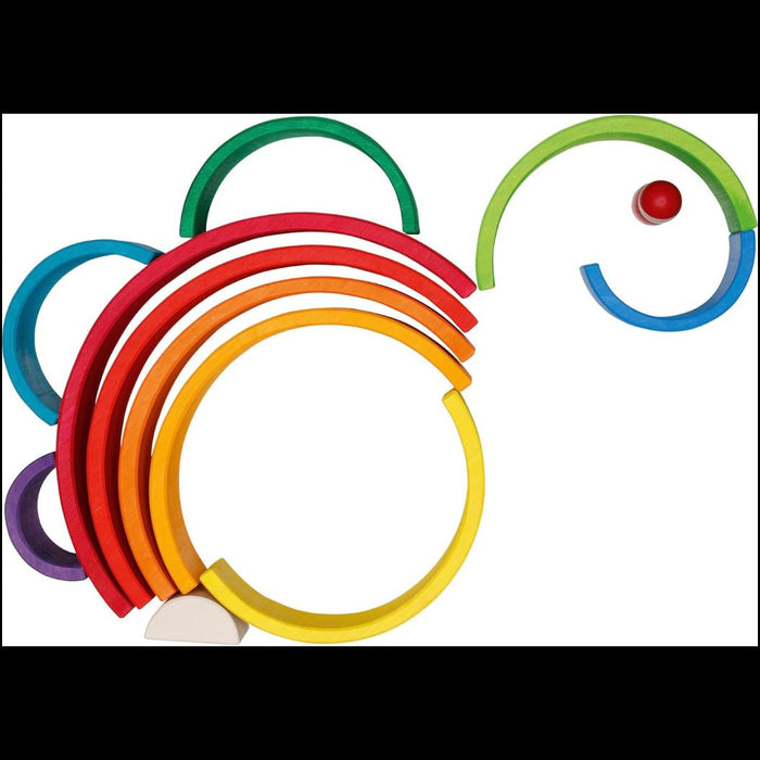 Set of colorful wooden half circle shapes on a white background