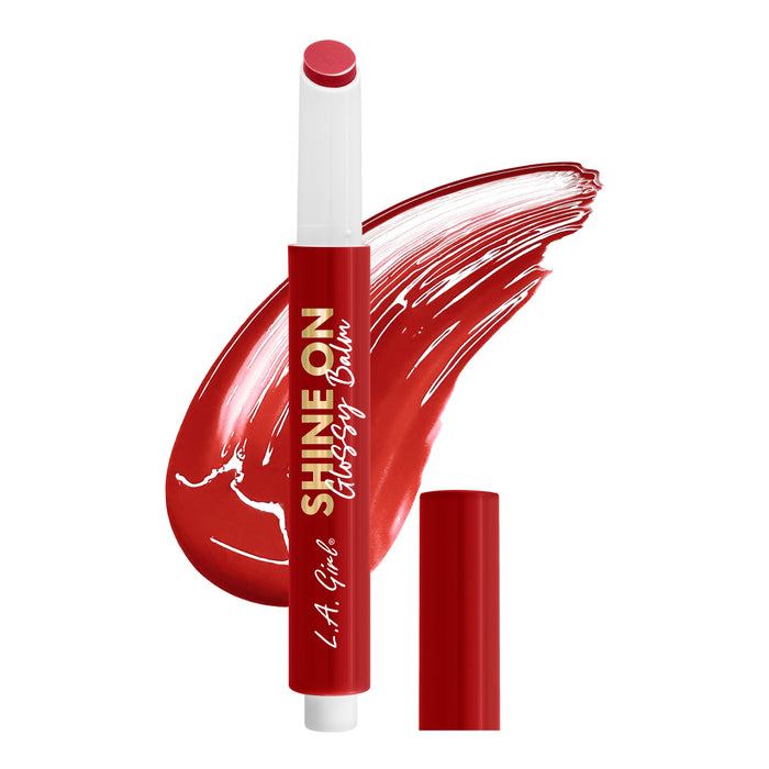 Red lip gloss with 'Shine On' text on a white background