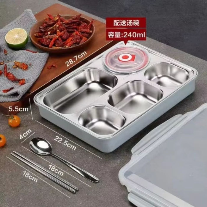 Close-up view of 5-compartment stainless steel meal tray showing portion control sections