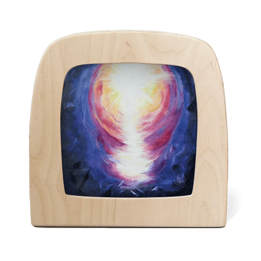 Wooden frame with a colorful abstract design of a bright light against a dark background
