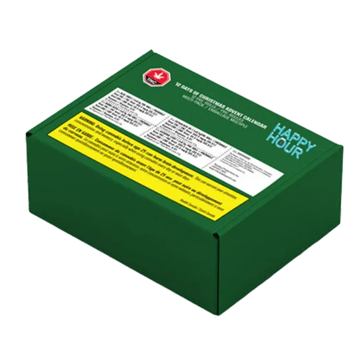 Angled view of a dark green box labeled "Twelve Days of Christmas Advent Box PR 12 x 0.5 g" with white and yellow warning panels and "HAPPY HOUR" text on the lid