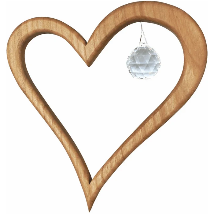 Wooden heart-shaped suncatcher with  crystal on a white background